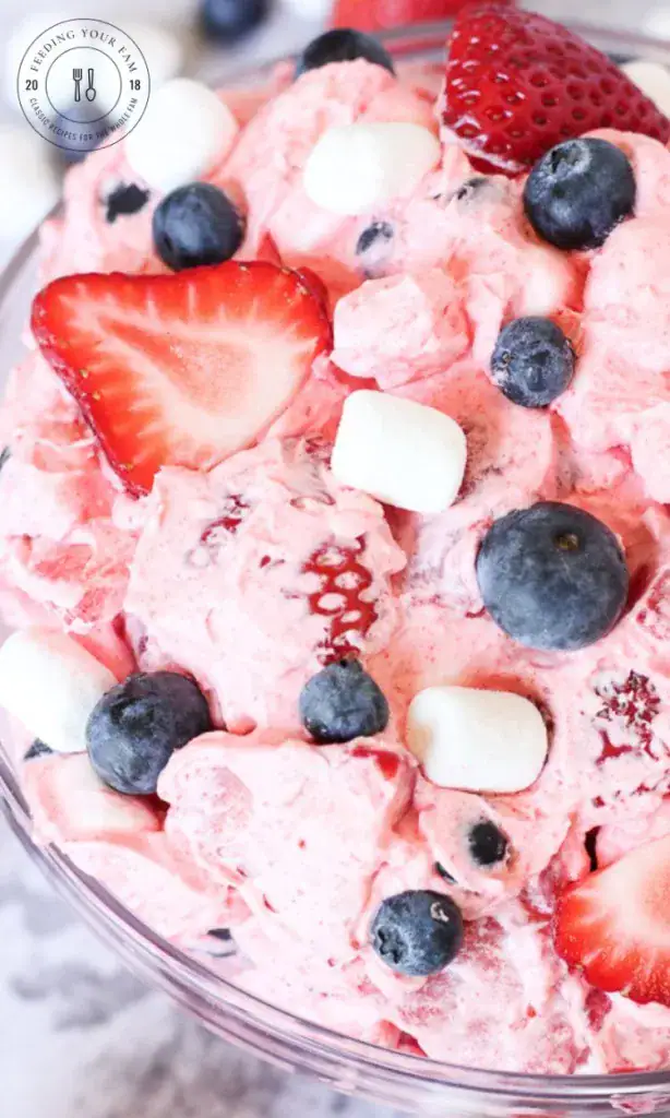bowl of ink strawberry fluff with berries