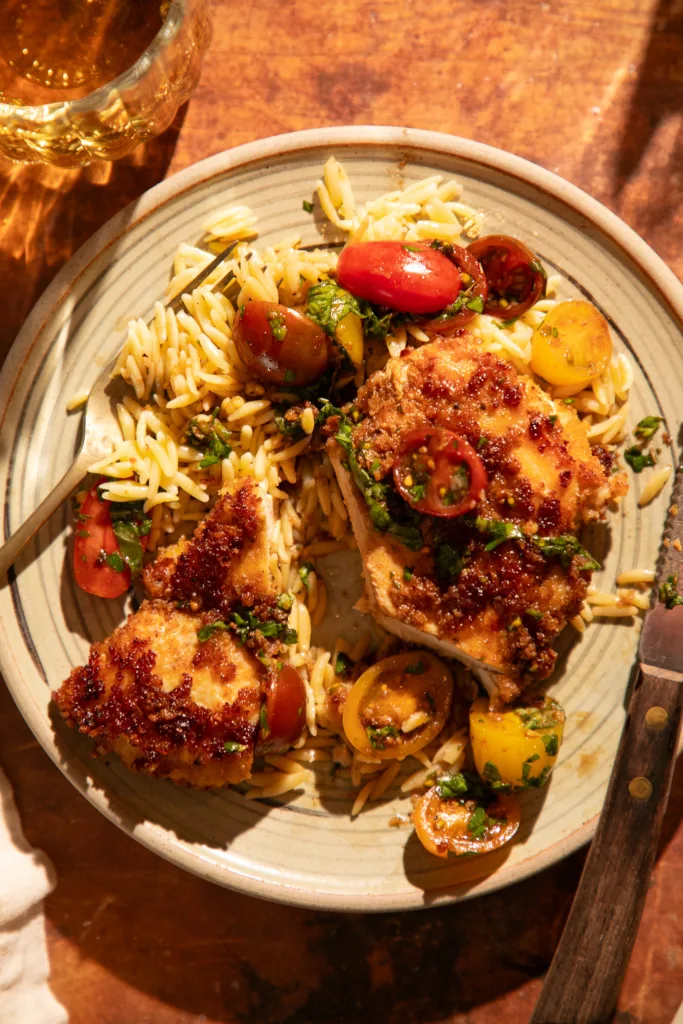 Plate with crispy chicken cutlet and bruschetta