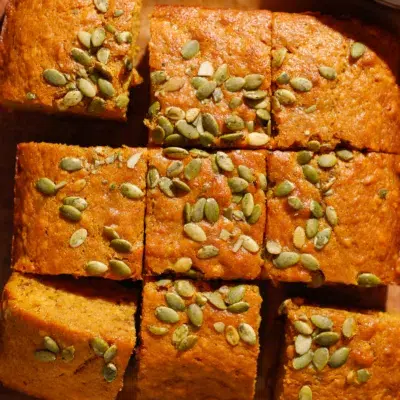 Slices of maple banana bread topped with pepitas