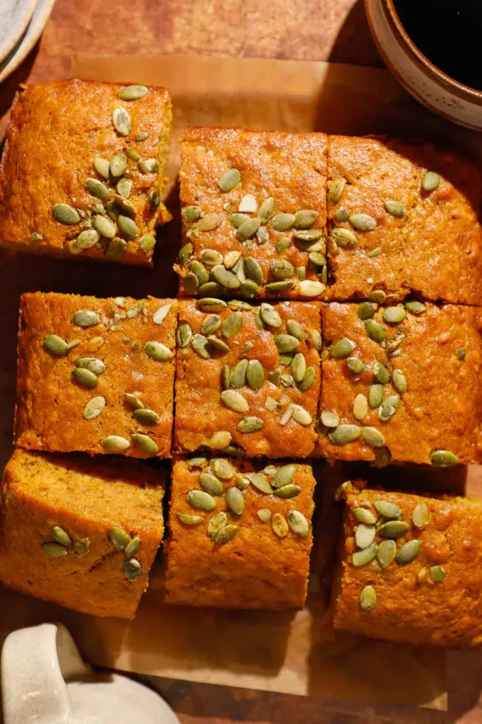 Slices of maple banana bread topped with pepitas