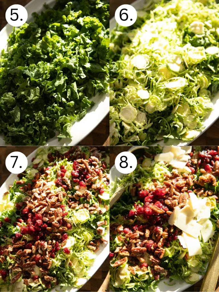 Chopped kale arranged on a platter, topped with shaved Brussels sprouts, then layered with toasted pecans, dried cranberries, and shaved cheese for a fresh Brussels sprout and kale salad.