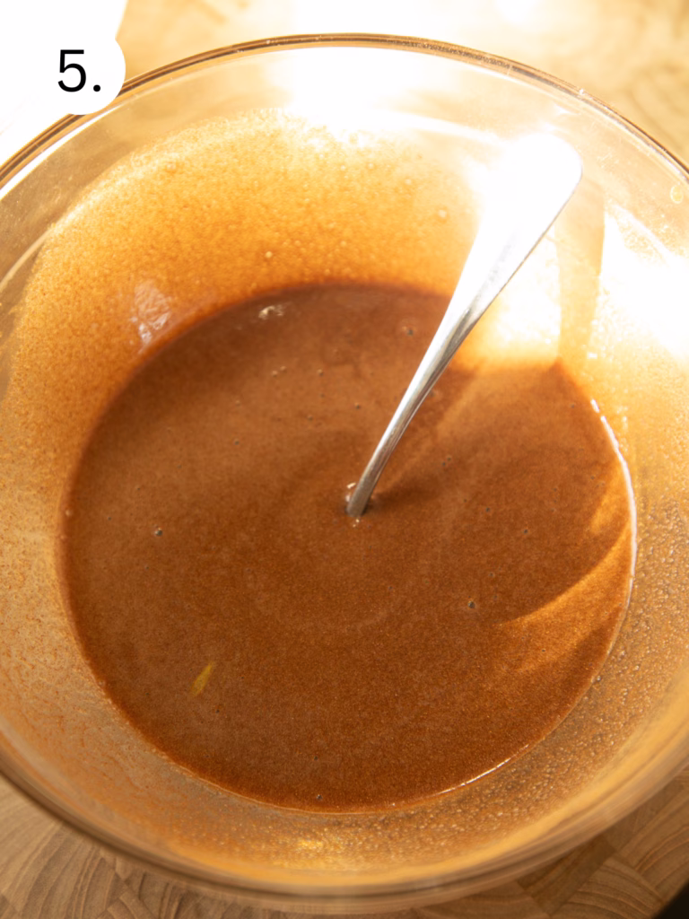 Cinnamon sugar swirl mixture in a bowl used to create the signature cinnamon roll swirl in pancakes