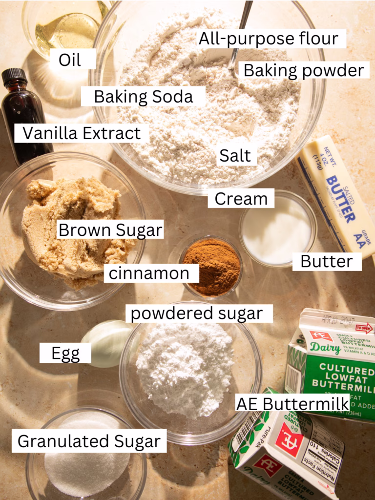 Ingredients for cinnamon swirl buttermilk pancakes including flour, brown sugar, cinnamon, butter, egg, vanilla, and AE Dairy buttermilk