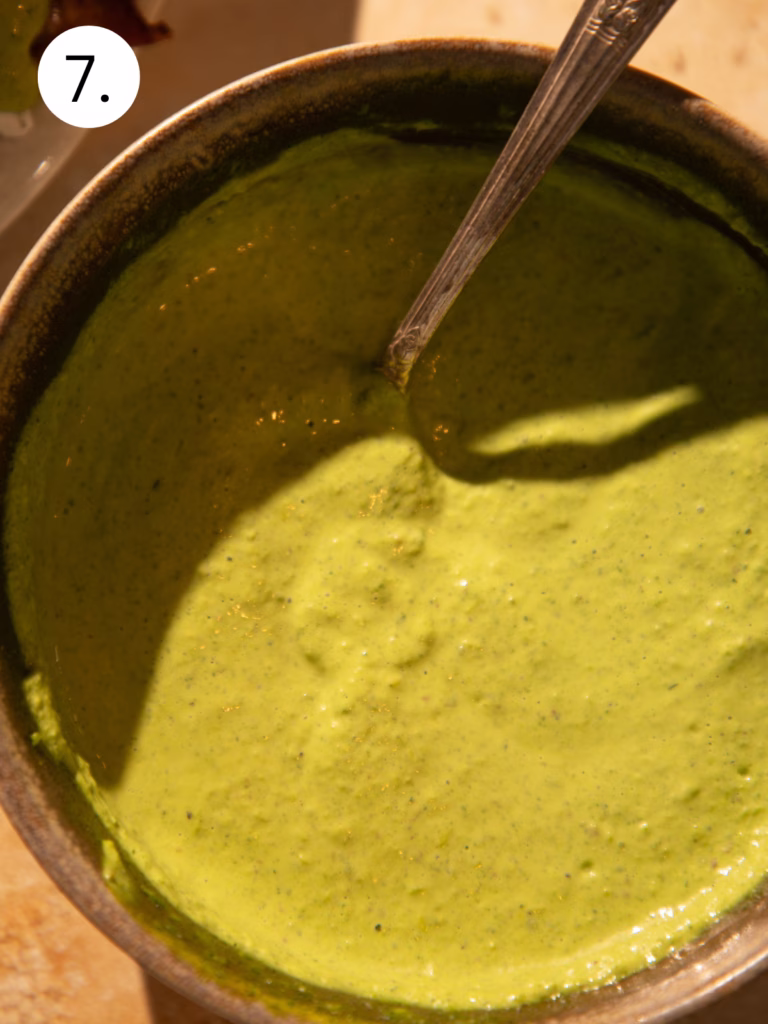 Creamy homemade Green Goddess dressing blended until smooth and vibrant green.